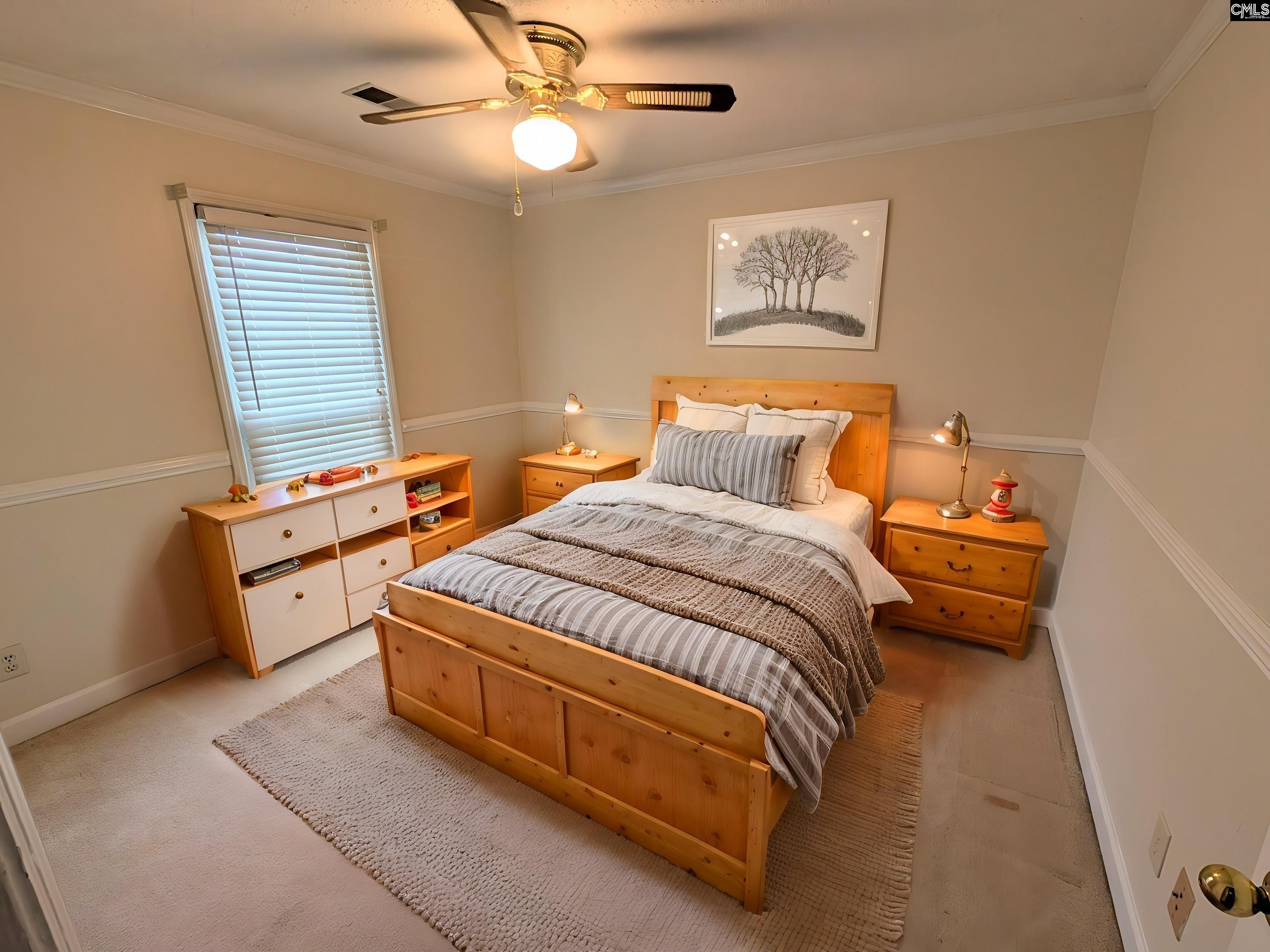 100 Welsh Court Lexington, SC 29073 - Photo 13 of 27 a bedroom with a bed and a night stand