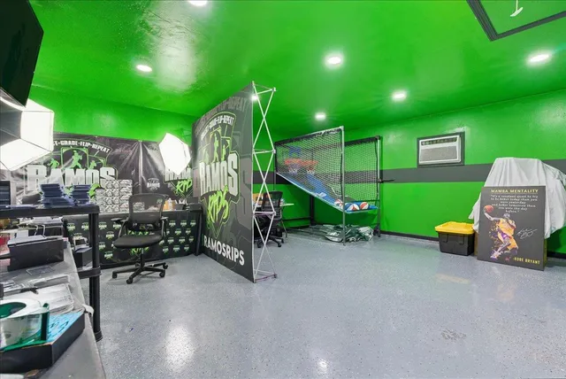 a view of a chairs and tables in the back yard of the house