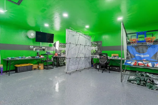 a view of a backyard with sitting area