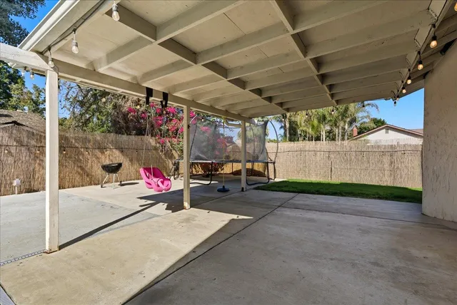 a view of a building with sitting area