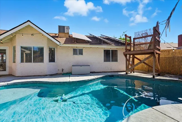 an aerial view of a house with a garden