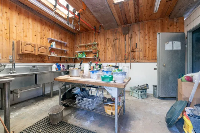 a outdoor dining space with furniture and a potted plant