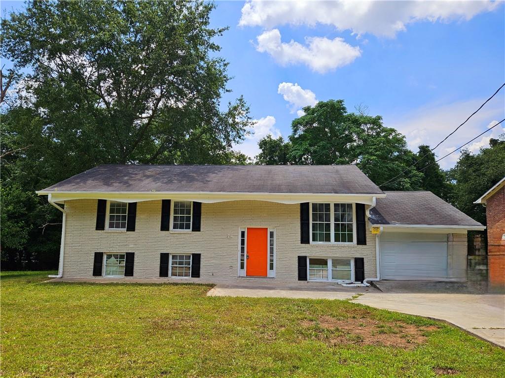front view of a house with a yard