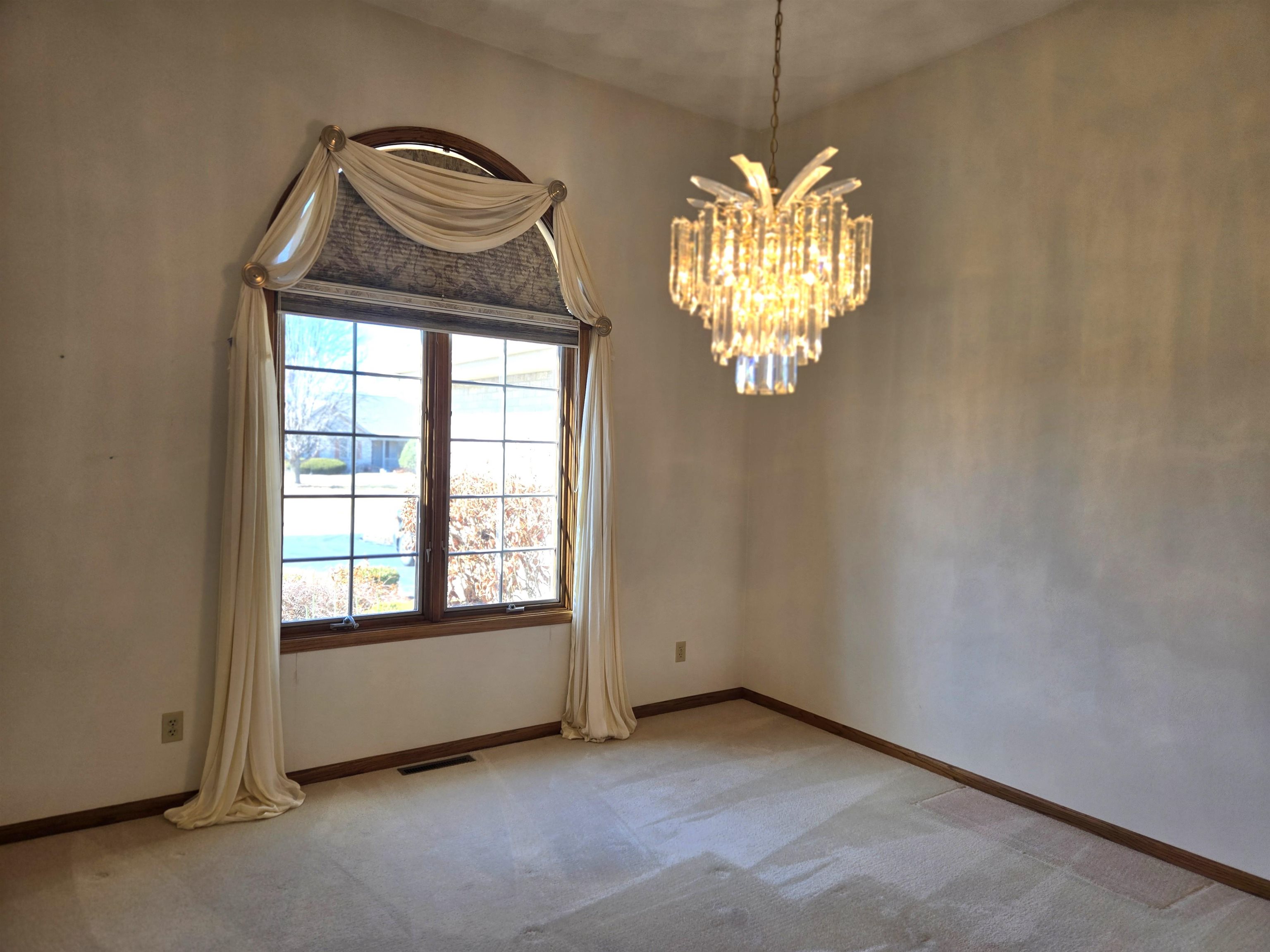 2862 Dourdan Road Belvidere, IL 61008 - Photo 5 of 28 an empty room with windows