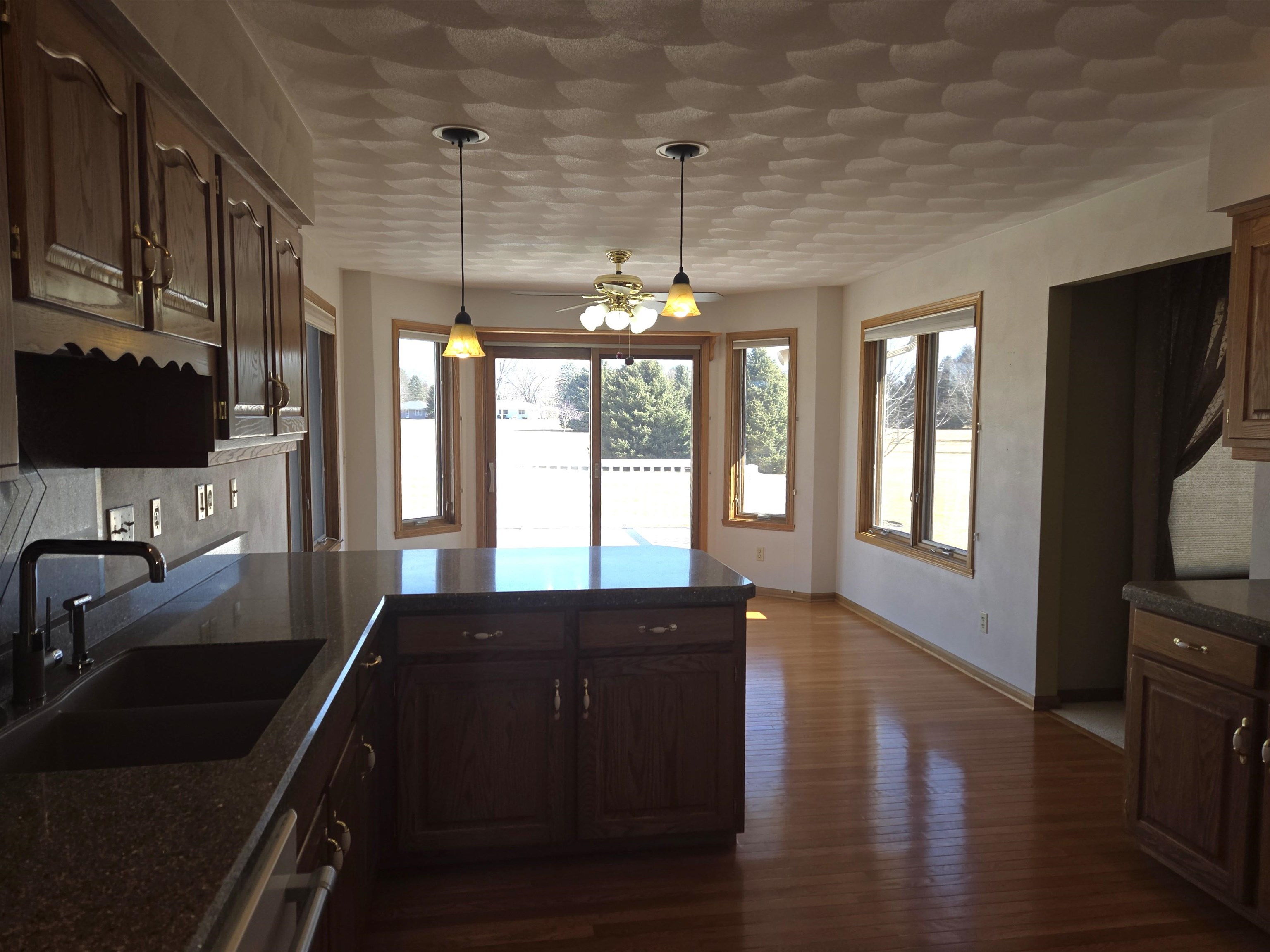 2862 Dourdan Road Belvidere, IL 61008 - Photo 10 of 28 a kitchen with a sink and a window