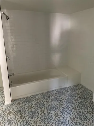 a bath room with a shower