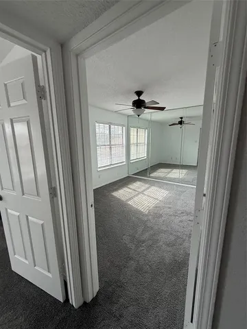 a view of empty room with windows