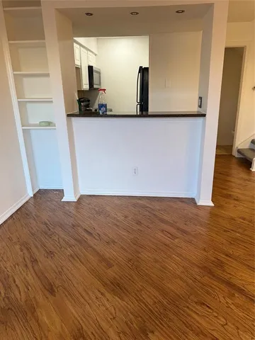 a view of a kitchen from the hallway