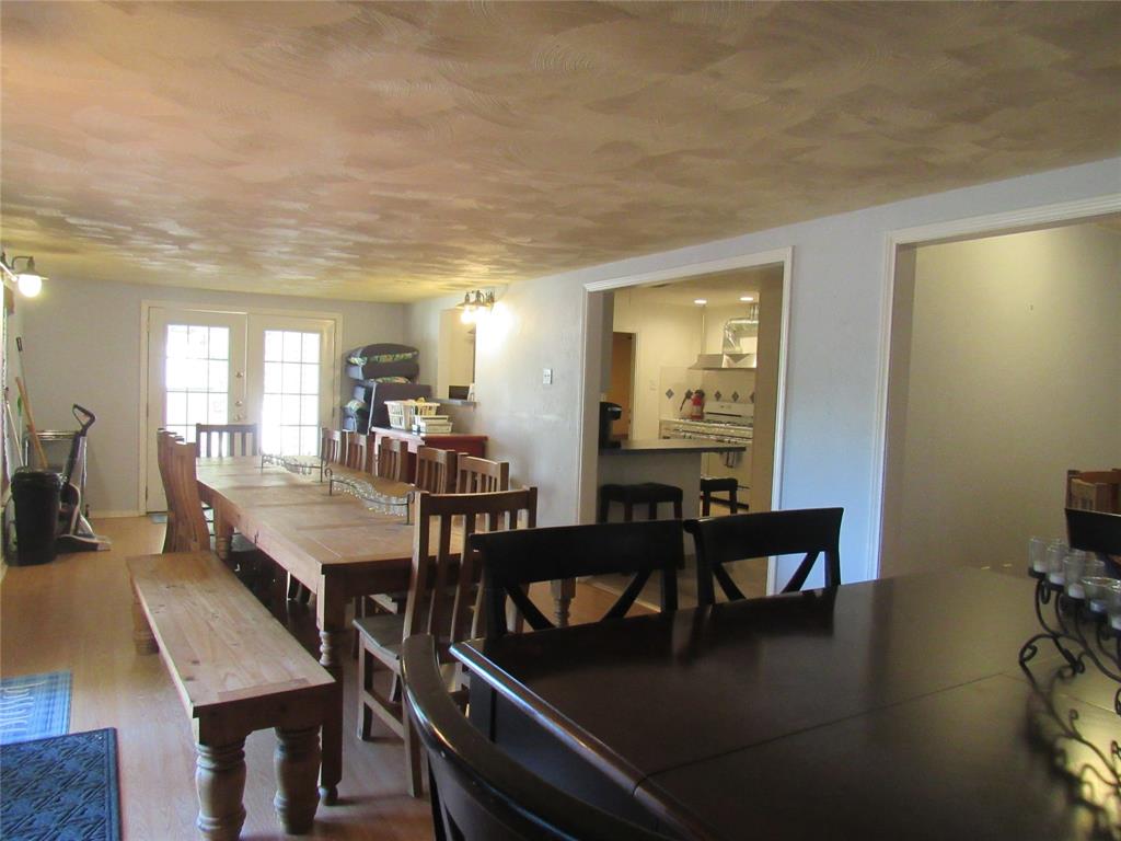 498 Homesite Road Pottsboro, TX 75076 - Photo 13 of 35 a view of a dining room with furniture