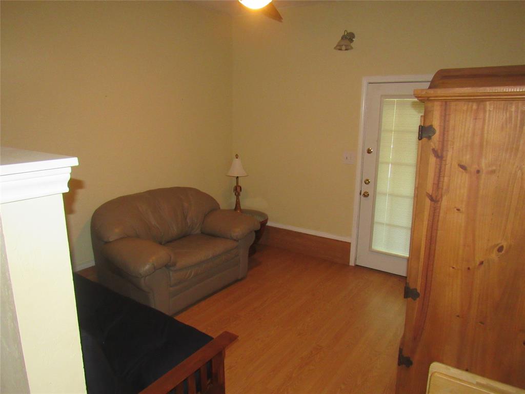 498 Homesite Road Pottsboro, TX 75076 - Photo 23 of 35 a living room with furniture and a shower
