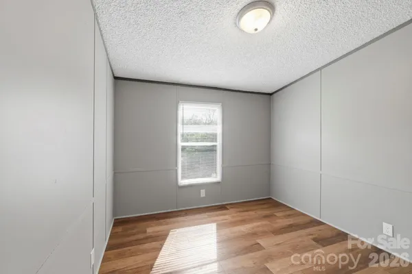 a view of a room with a window