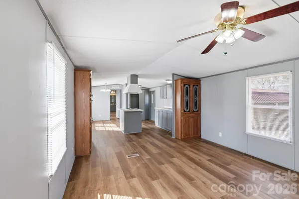 a view of a furniture in a room with a window