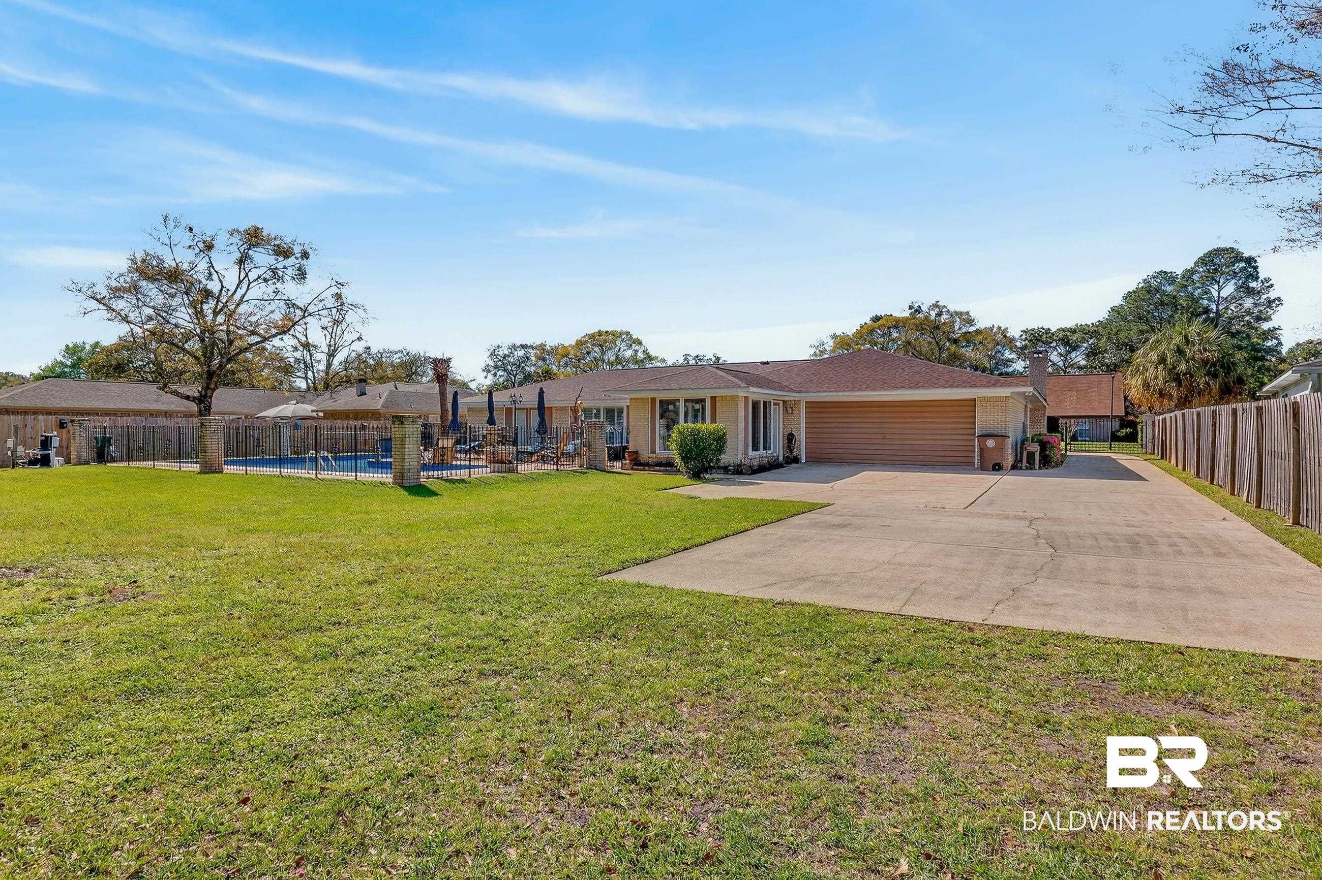 1271 Spring Valley Drive South Mobile, AL 36693 - Photo 50 of 56 View of front of house with an attached garage and concrete driveway