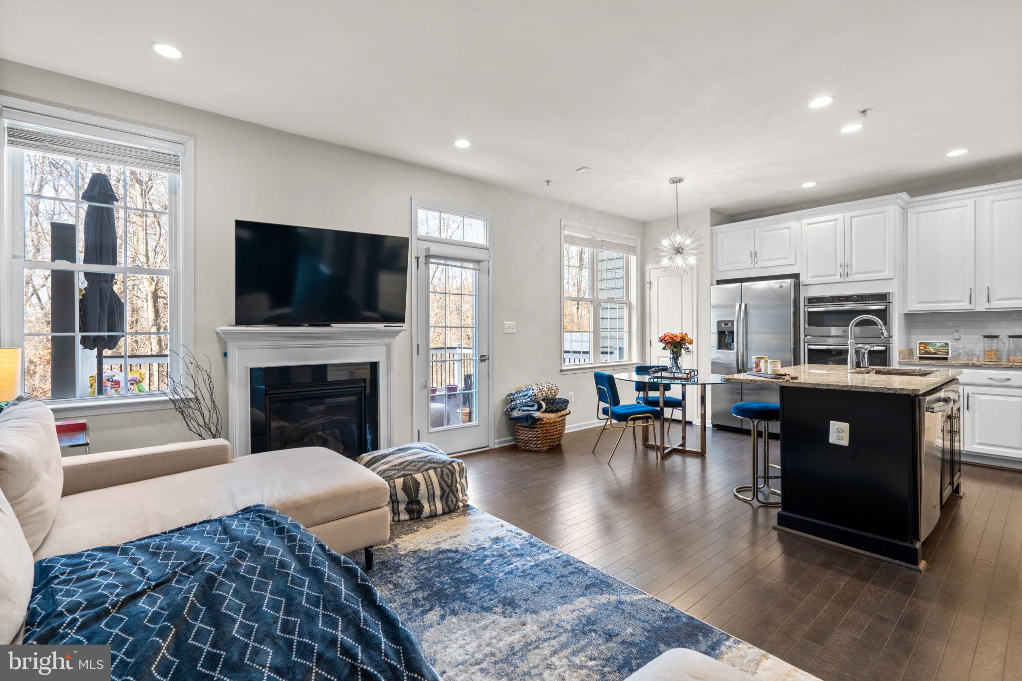 4323 Spring Foal Court Upper Marlboro, MD 20772 - Photo 19 of 49 a living room with fireplace furniture and a flat screen tv