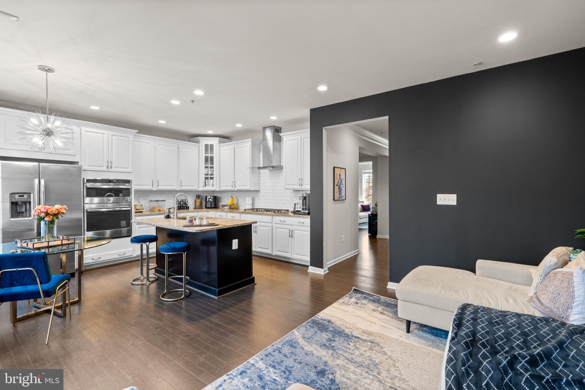 4323 Spring Foal Court Upper Marlboro, MD 20772 - Photo 20 of 49 a living room with furniture and kitchen view