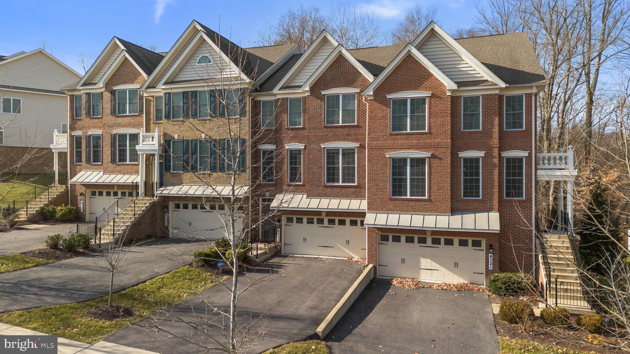 4323 Spring Foal Court Upper Marlboro, MD 20772 - Photo 3 of 49 a front view of a house with a yard