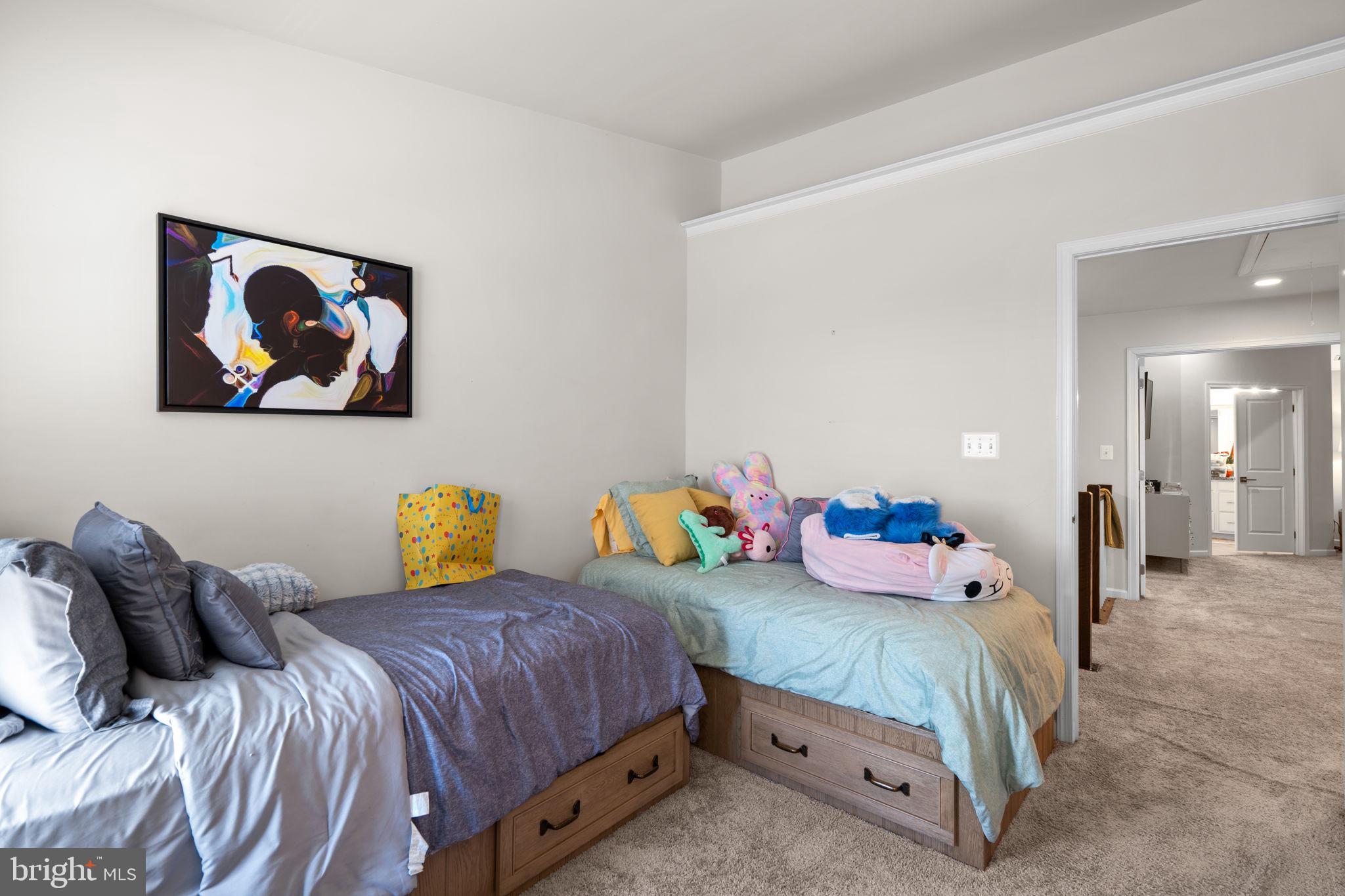 4323 Spring Foal Court Upper Marlboro, MD 20772 - Photo 33 of 49 a bedroom with a bed and a painting on the wall