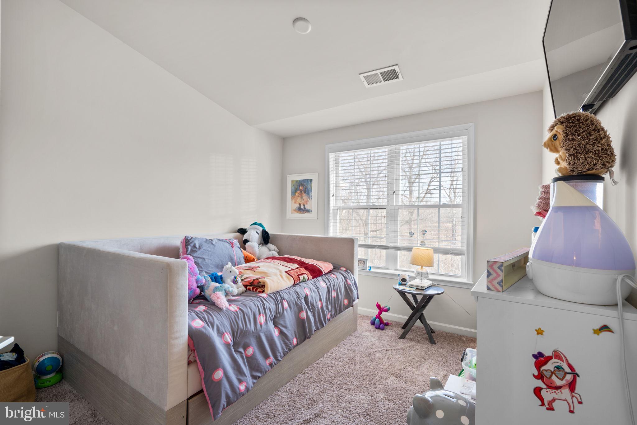 4323 Spring Foal Court Upper Marlboro, MD 20772 - Photo 34 of 49 a bed room with a bed and a window