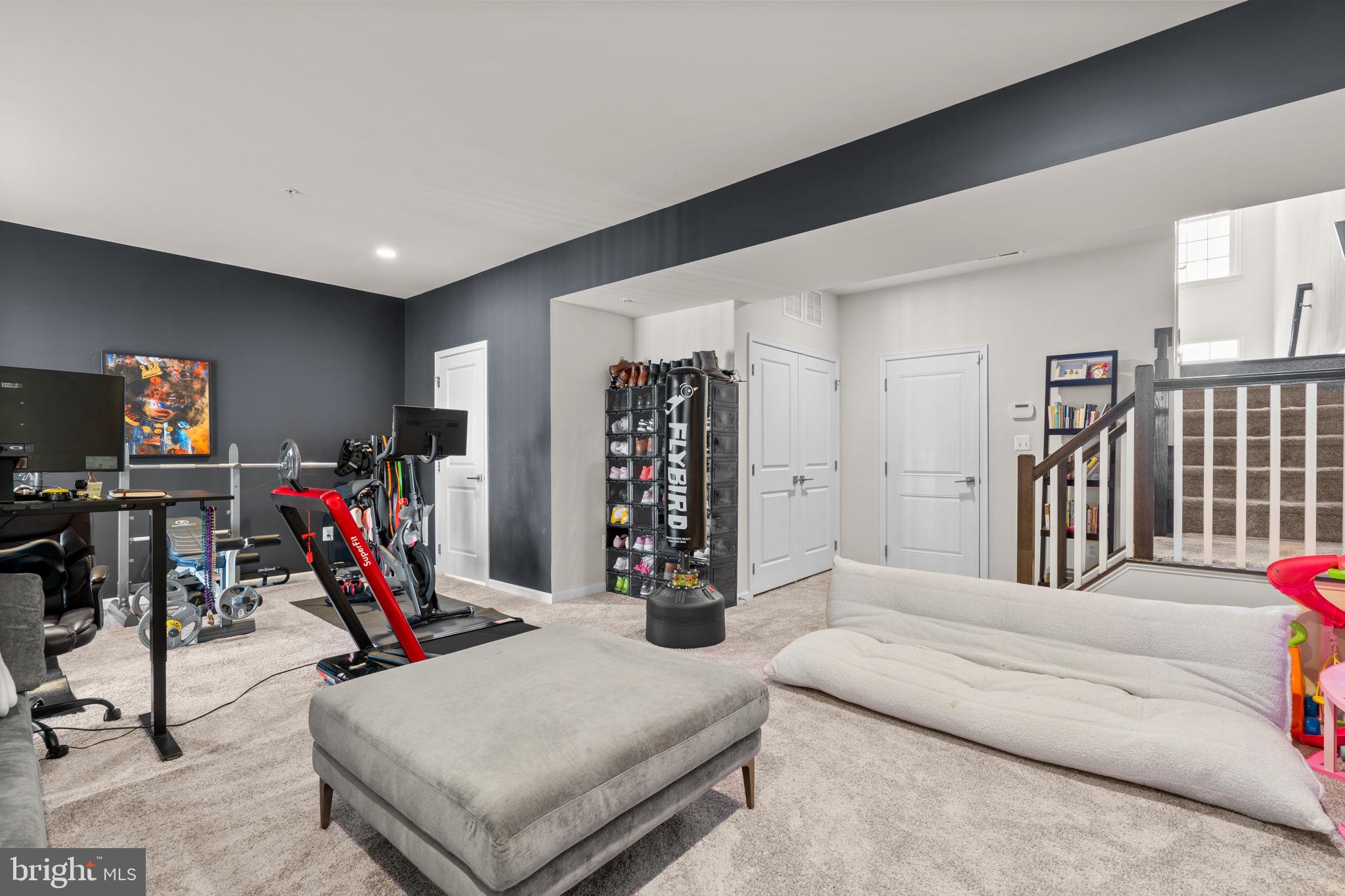 4323 Spring Foal Court Upper Marlboro, MD 20772 - Photo 38 of 49 a bedroom with furniture and white couch