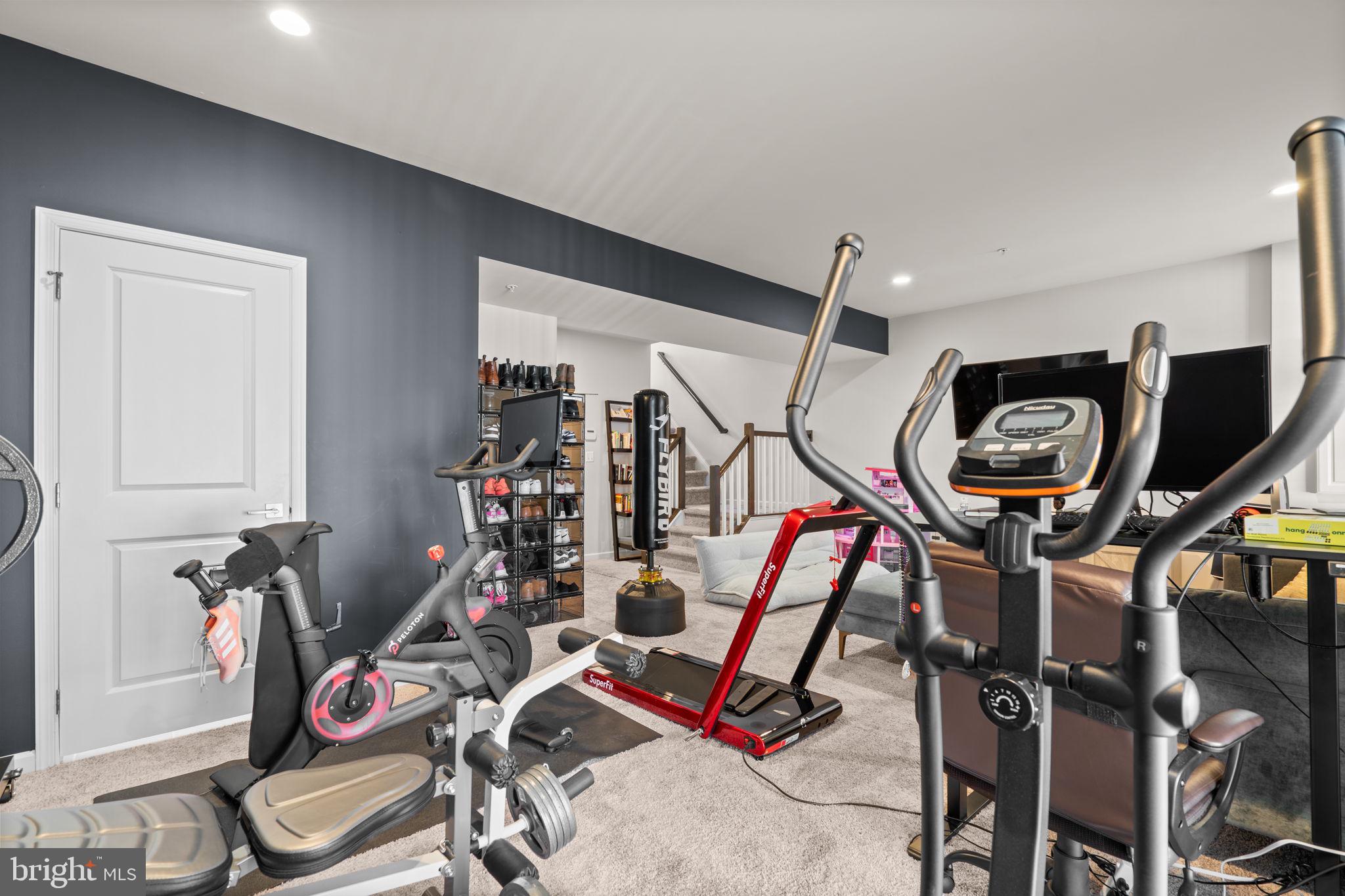 4323 Spring Foal Court Upper Marlboro, MD 20772 - Photo 39 of 49 a view of a room with gym equipment