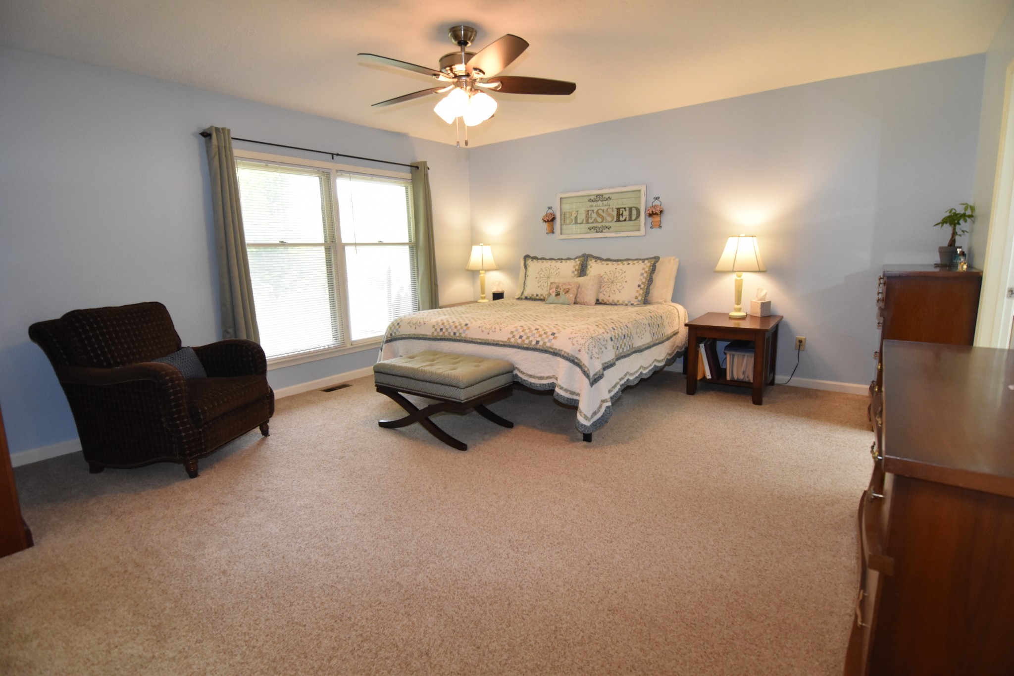 2513 Quarry Road Mount Juliet, TN 37122 - Photo 16 of 42 a spacious bedroom with a bed and a couch