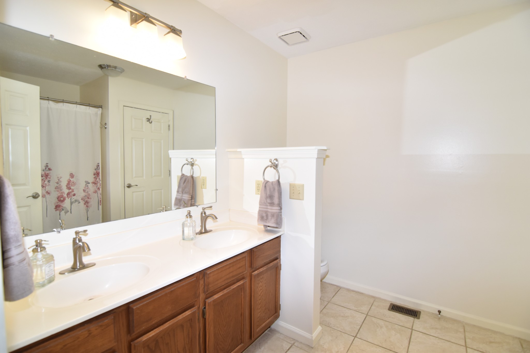 2513 Quarry Road Mount Juliet, TN 37122 - Photo 17 of 42 a bathroom with a sink and a mirror