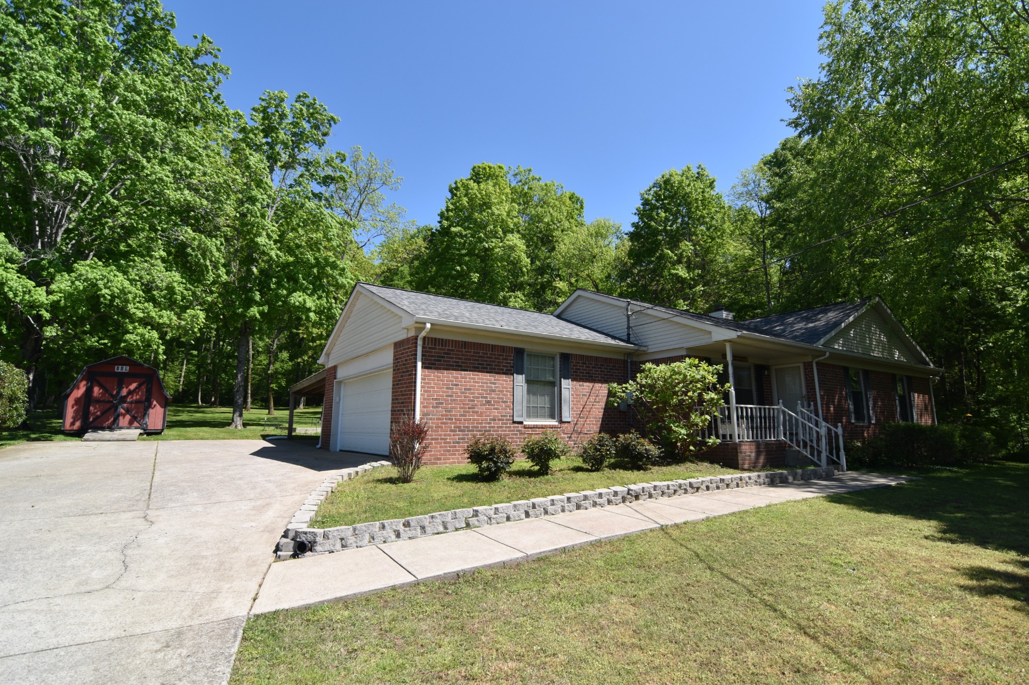 2513 Quarry Road Mount Juliet, TN 37122 - Photo 27 of 42 a view of a house with a yard