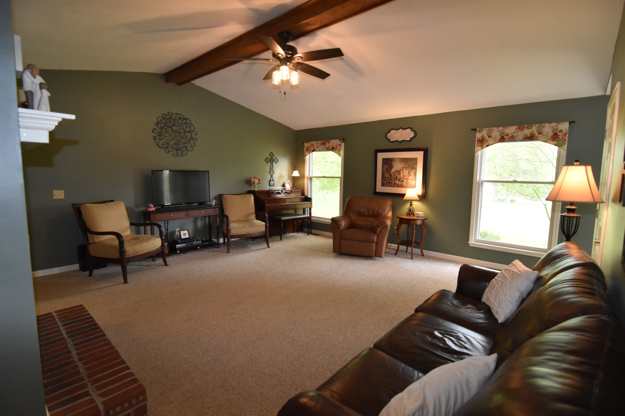 2513 Quarry Road Mount Juliet, TN 37122 - Photo 8 of 42 a living room with furniture and a chandelier