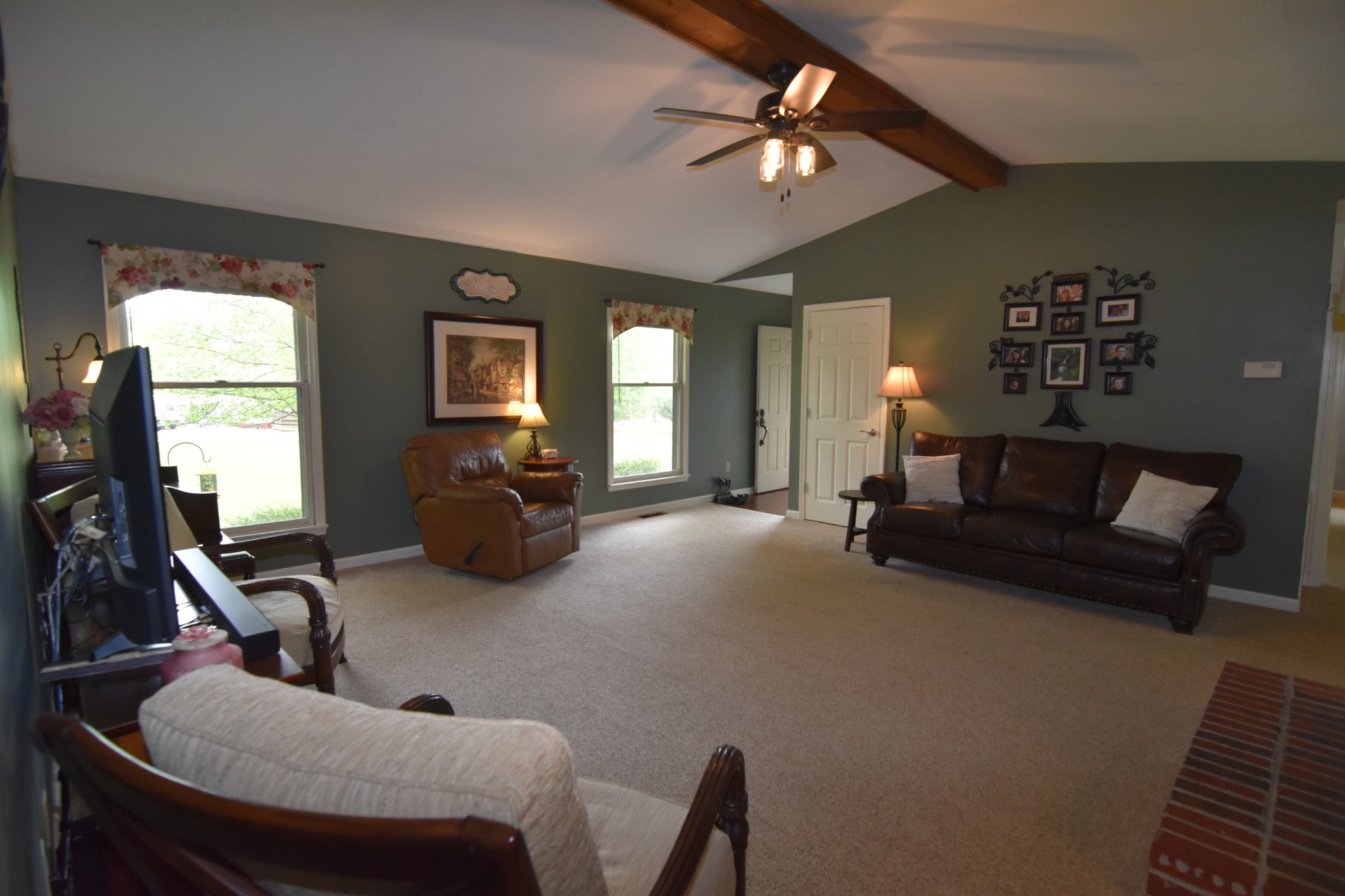 2513 Quarry Road Mount Juliet, TN 37122 - Photo 10 of 42 a living room with furniture and a chandelier