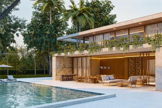 a view of a patio with a table chairs and a small yard