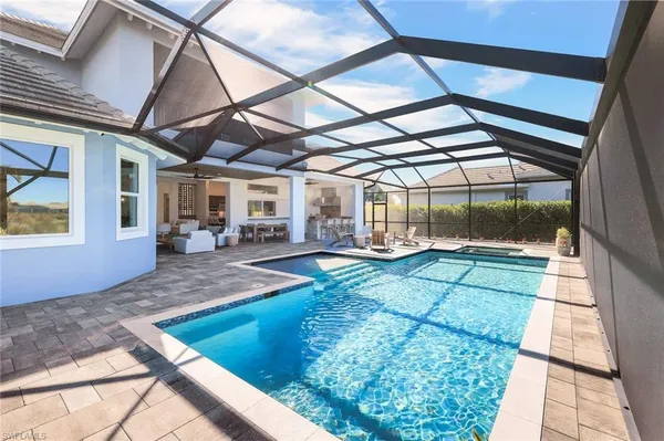 a view of a backyard of a house