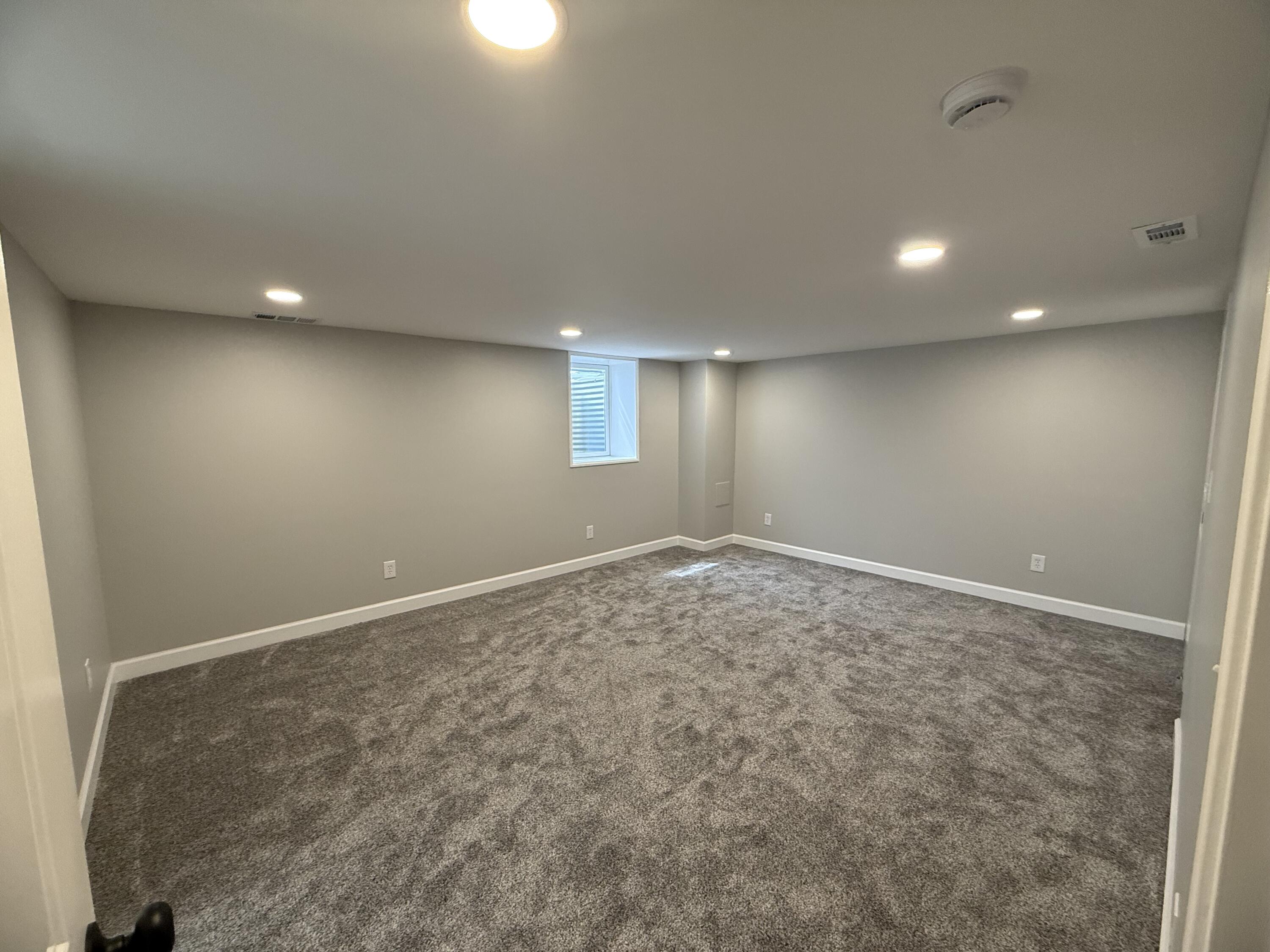 408 Cherry Hill Road Dyer, IN 46311 - Photo 21 of 31 an empty room with a natural light