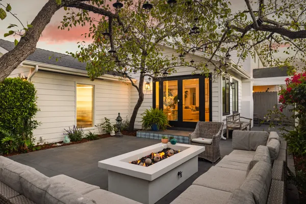 a outdoor living space with furniture and garden view