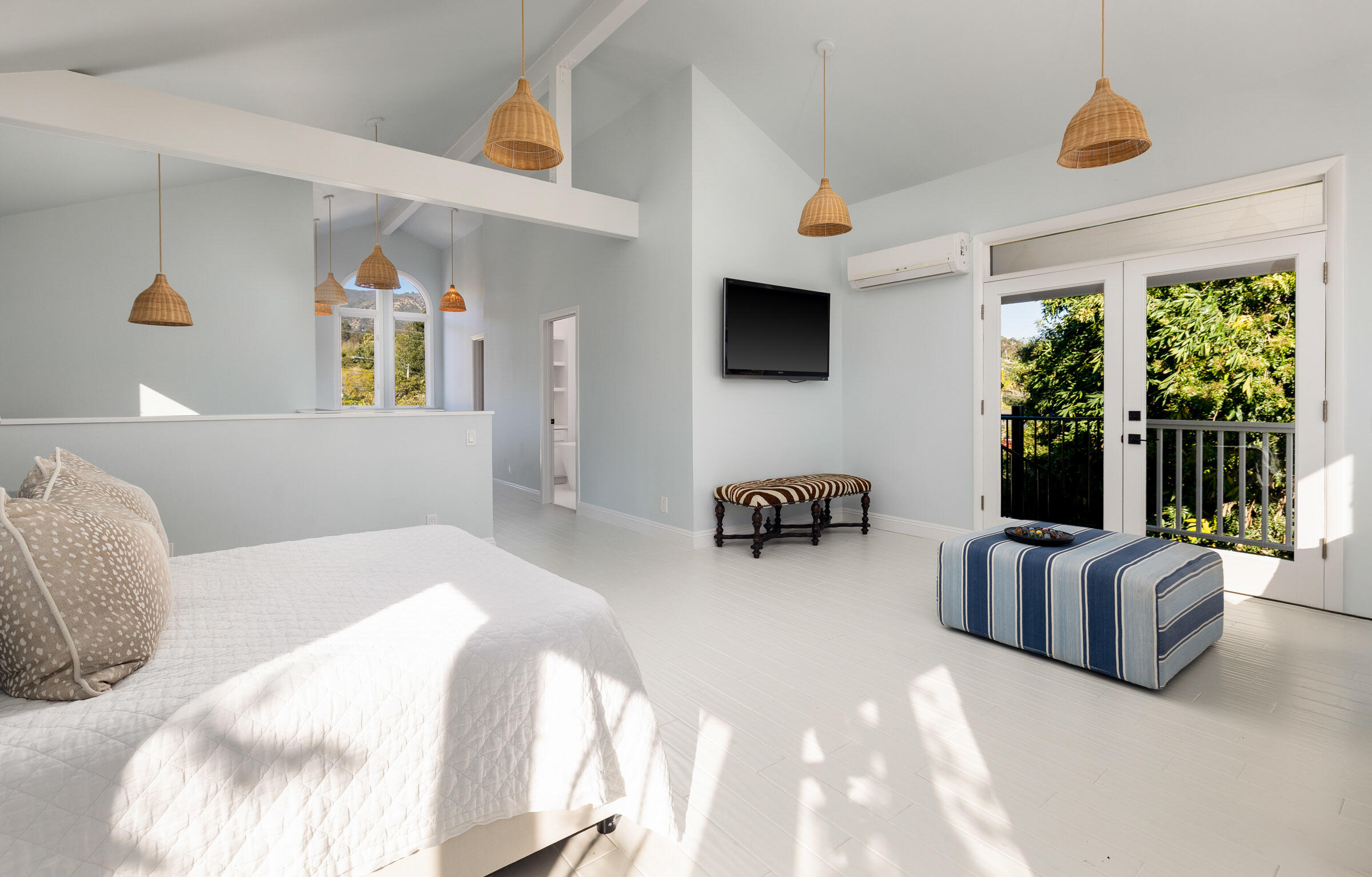 31 Cedar Lane Santa Barbara, CA 93108 - Photo 17 of 31 a bedroom with furniture and a flat screen tv