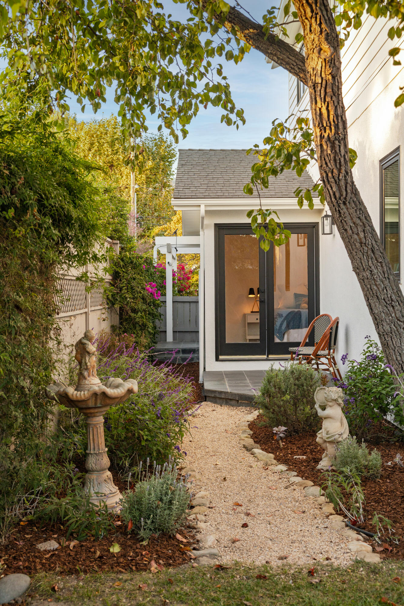 31 Cedar Lane Santa Barbara, CA 93108 - Photo 28 of 31 a view of a house with a small yard plants and a large tree