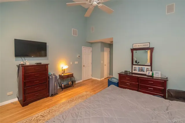 a view of a livingroom with furniture and a flat screen tv
