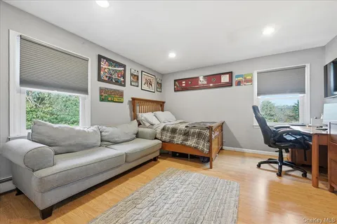 a living room with furniture and a window