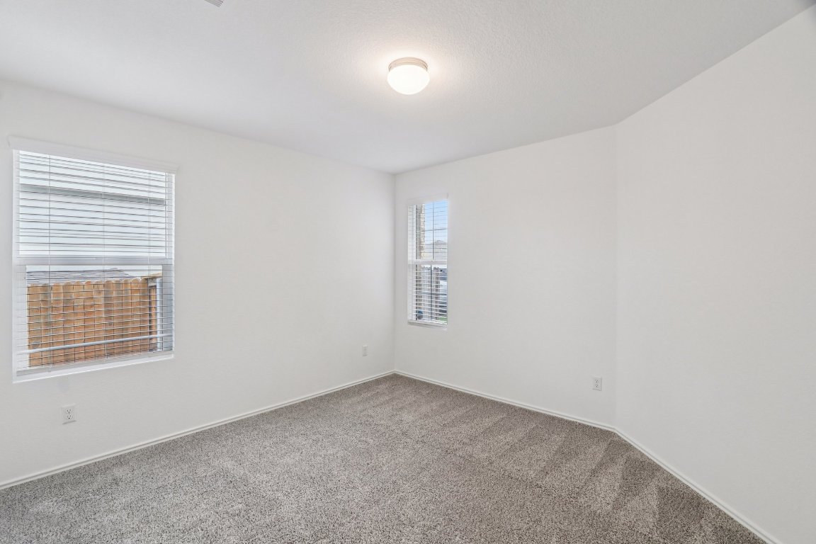 240 Line Of Fire Way Jarrell, TX 76537 - Photo 16 of 33 Bedroom 1