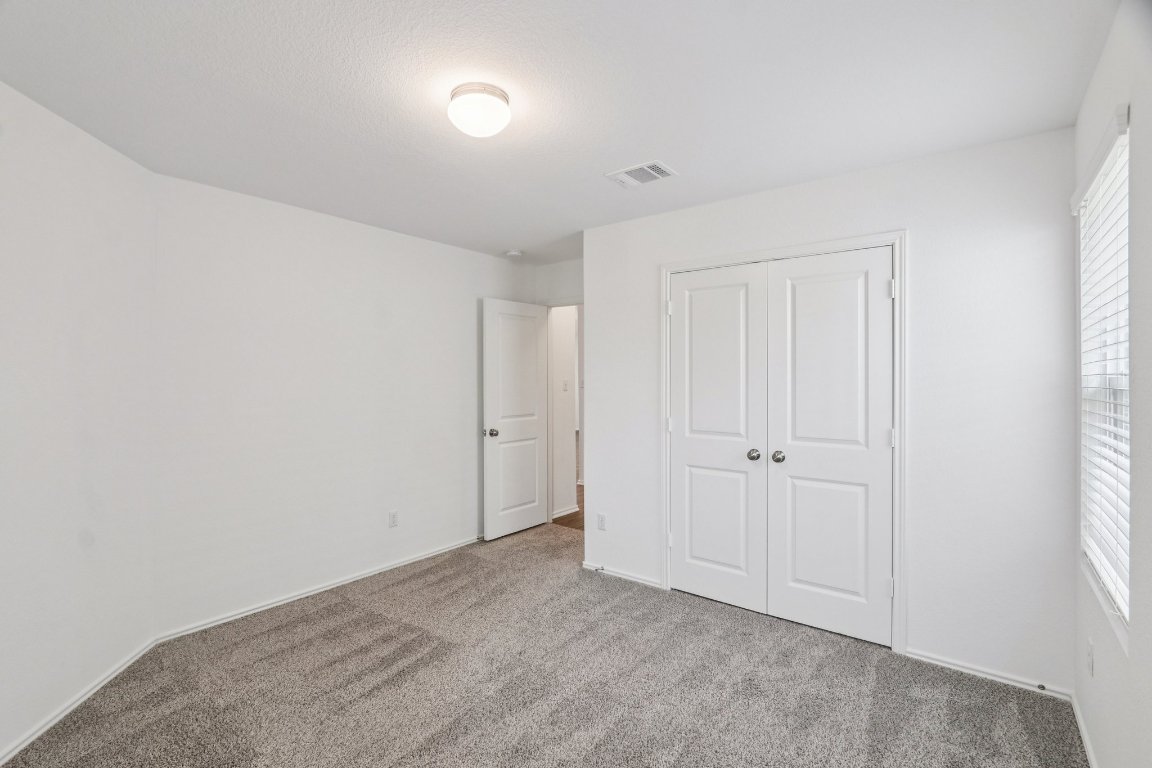 240 Line Of Fire Way Jarrell, TX 76537 - Photo 17 of 33 Bedroom 1