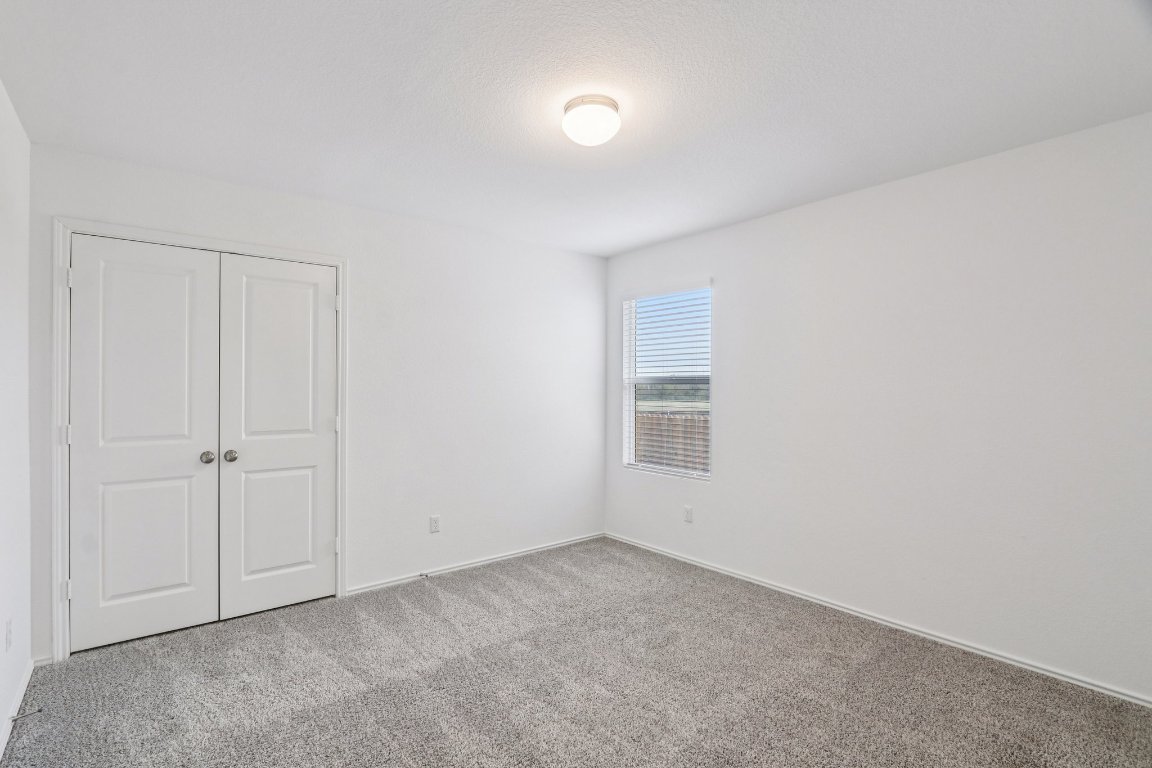 240 Line Of Fire Way Jarrell, TX 76537 - Photo 18 of 33 Bedroom 2