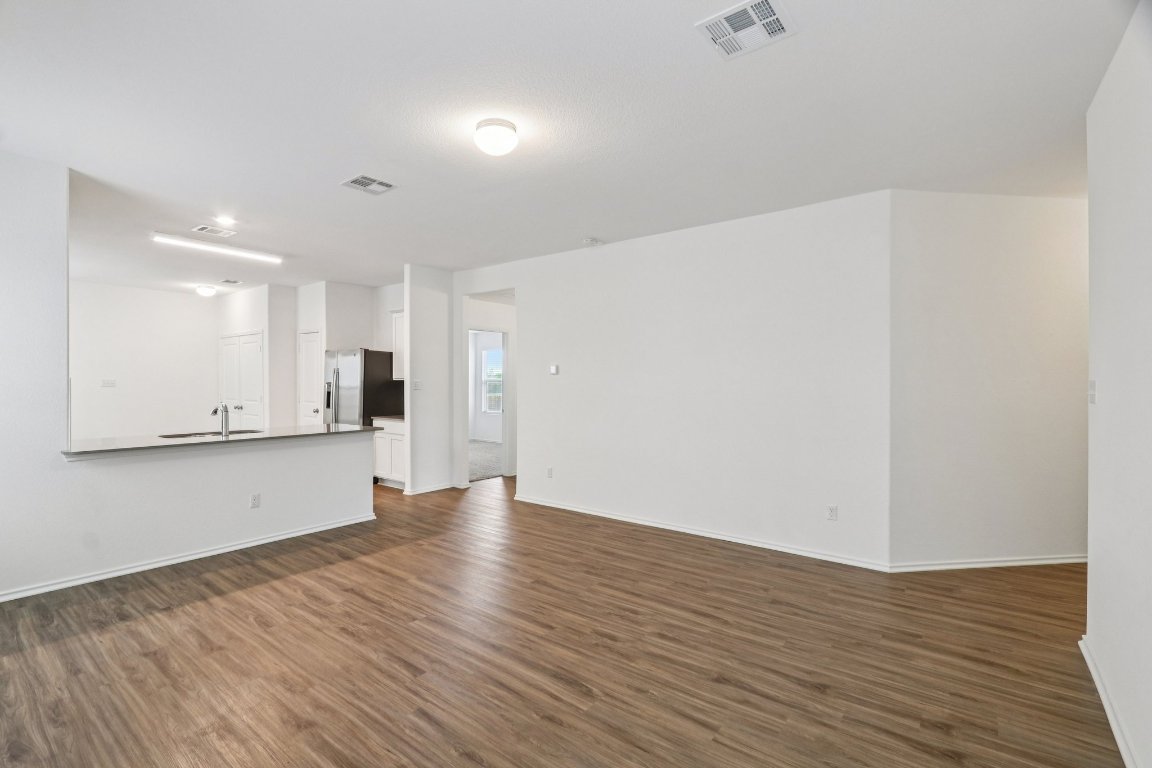 240 Line Of Fire Way Jarrell, TX 76537 - Photo 5 of 33 Unfurnished living room