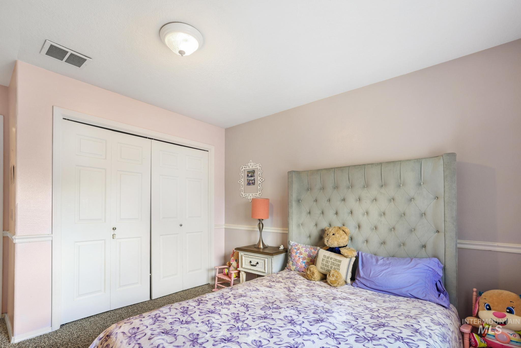 733 Beta Circle Twin Falls, ID 83301 - Photo 16 of 50 Carpeted bedroom featuring a closet