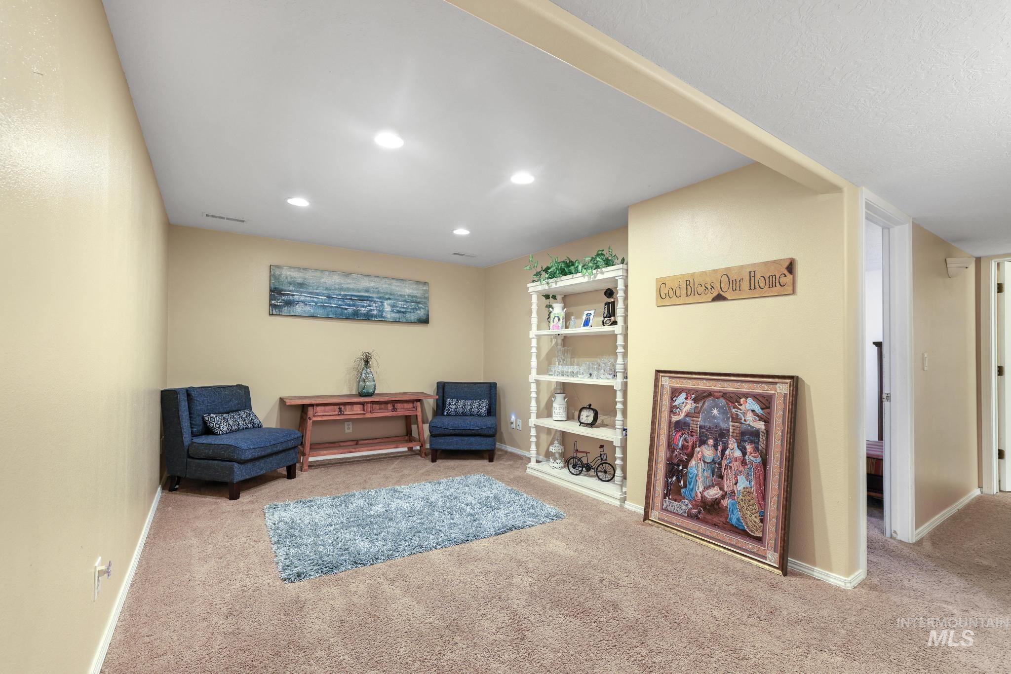 733 Beta Circle Twin Falls, ID 83301 - Photo 23 of 50 Sitting room with carpet flooring and recessed lighting