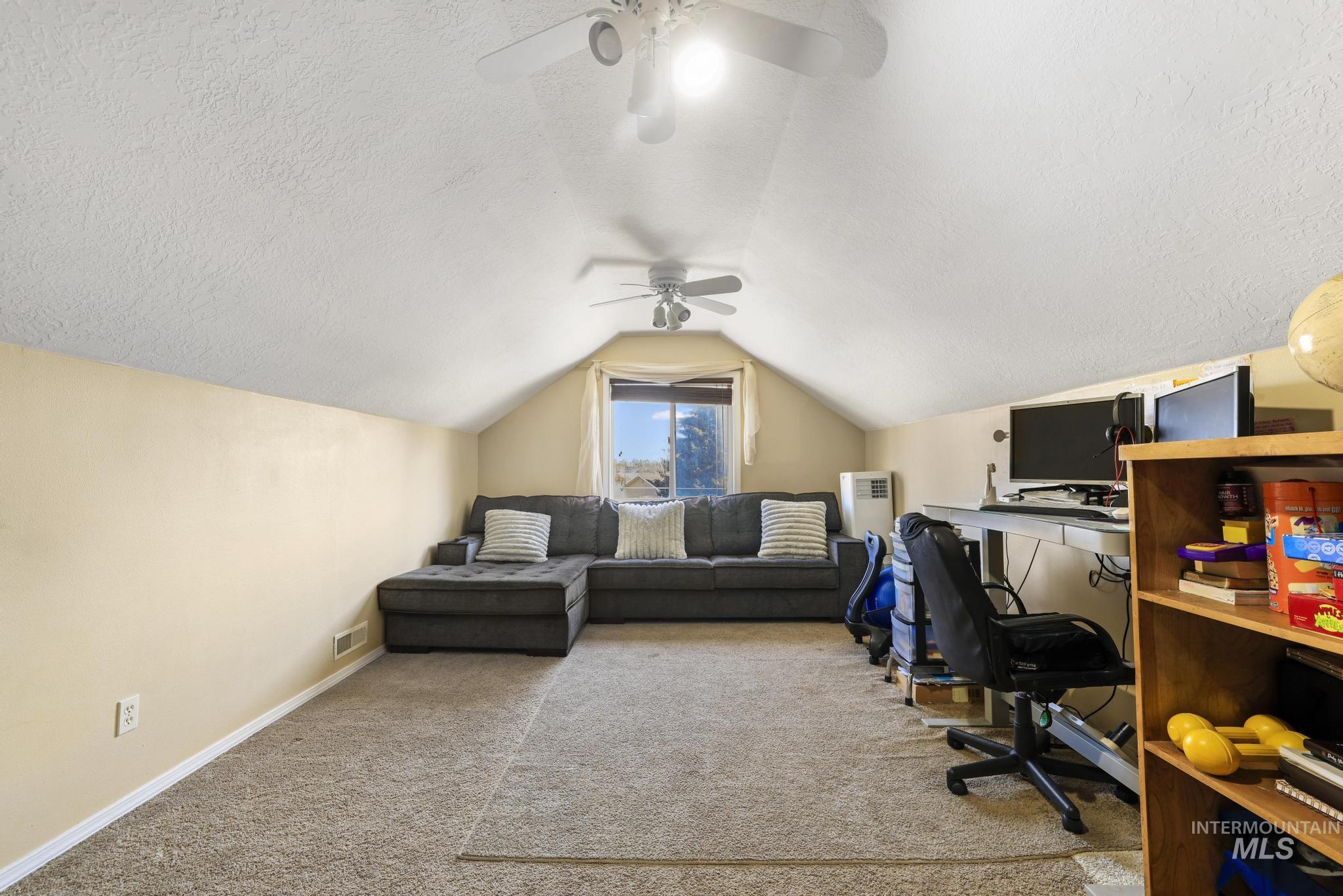 733 Beta Circle Twin Falls, ID 83301 - Photo 24 of 50 Office space featuring light carpet, a textured ceiling, and ceiling fan
