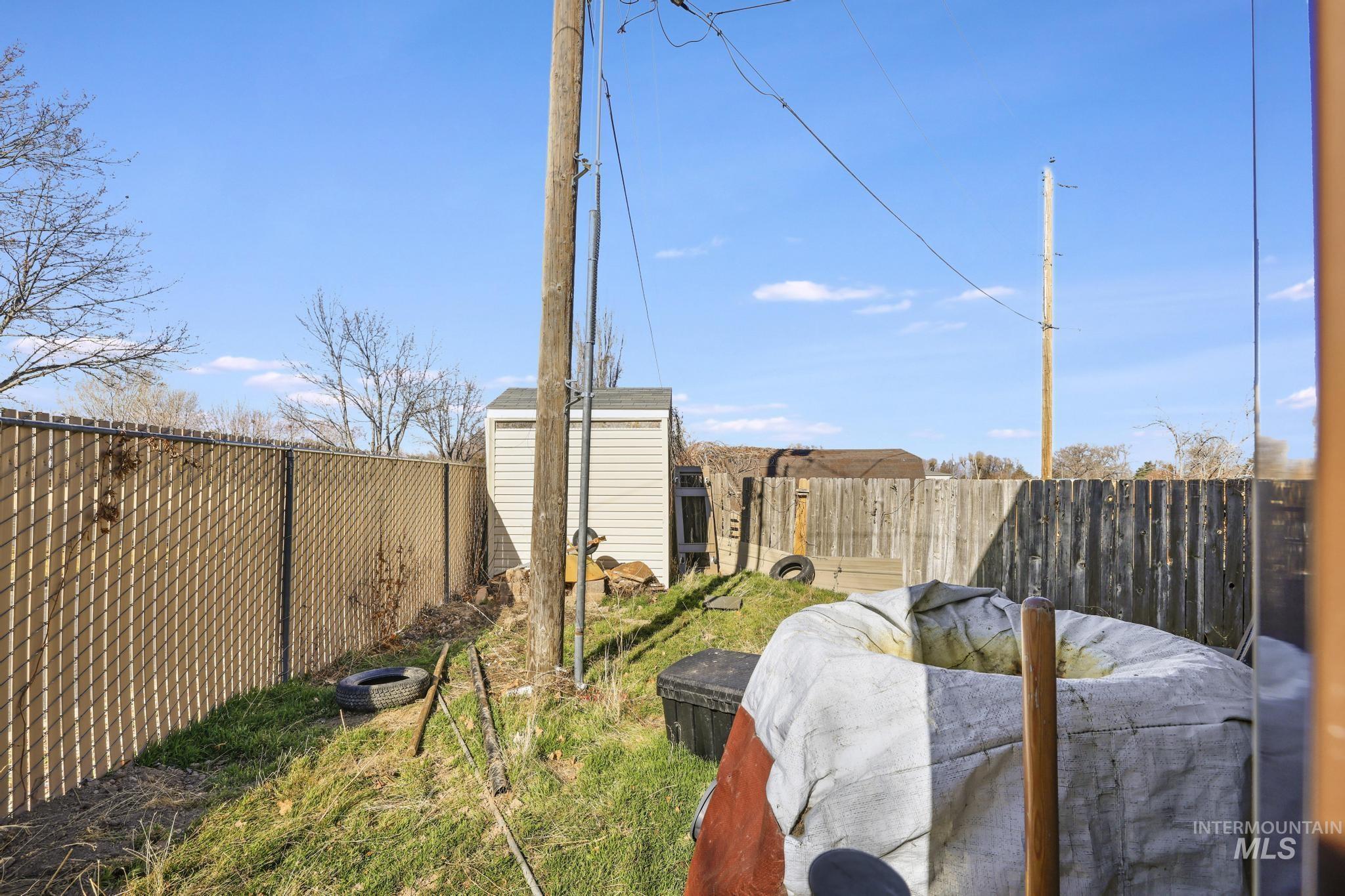 733 Beta Circle Twin Falls, ID 83301 - Photo 38 of 50 Fenced backyard with a storage shed