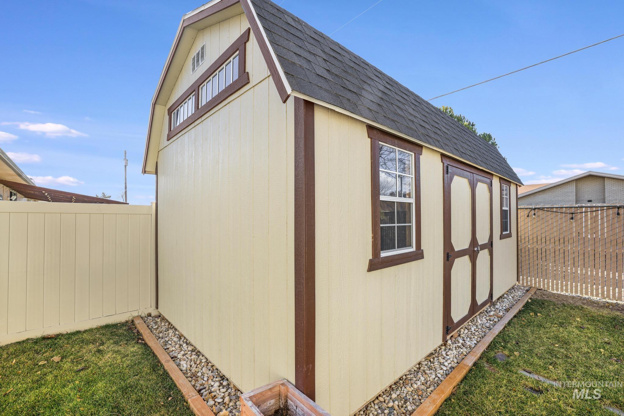 733 Beta Circle Twin Falls, ID 83301 - Photo 40 of 50 View of shed with a fenced backyard