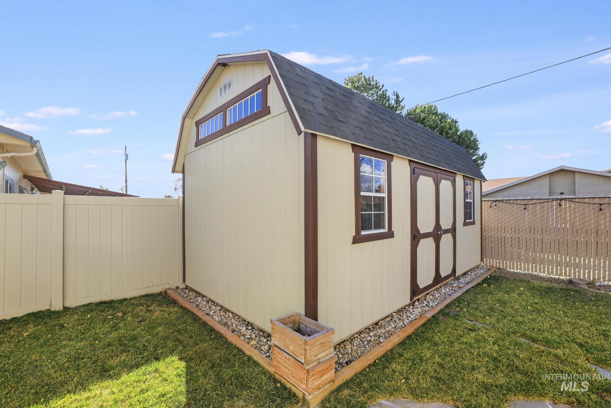 733 Beta Circle Twin Falls, ID 83301 - Photo 41 of 50 View of shed with a fenced backyard