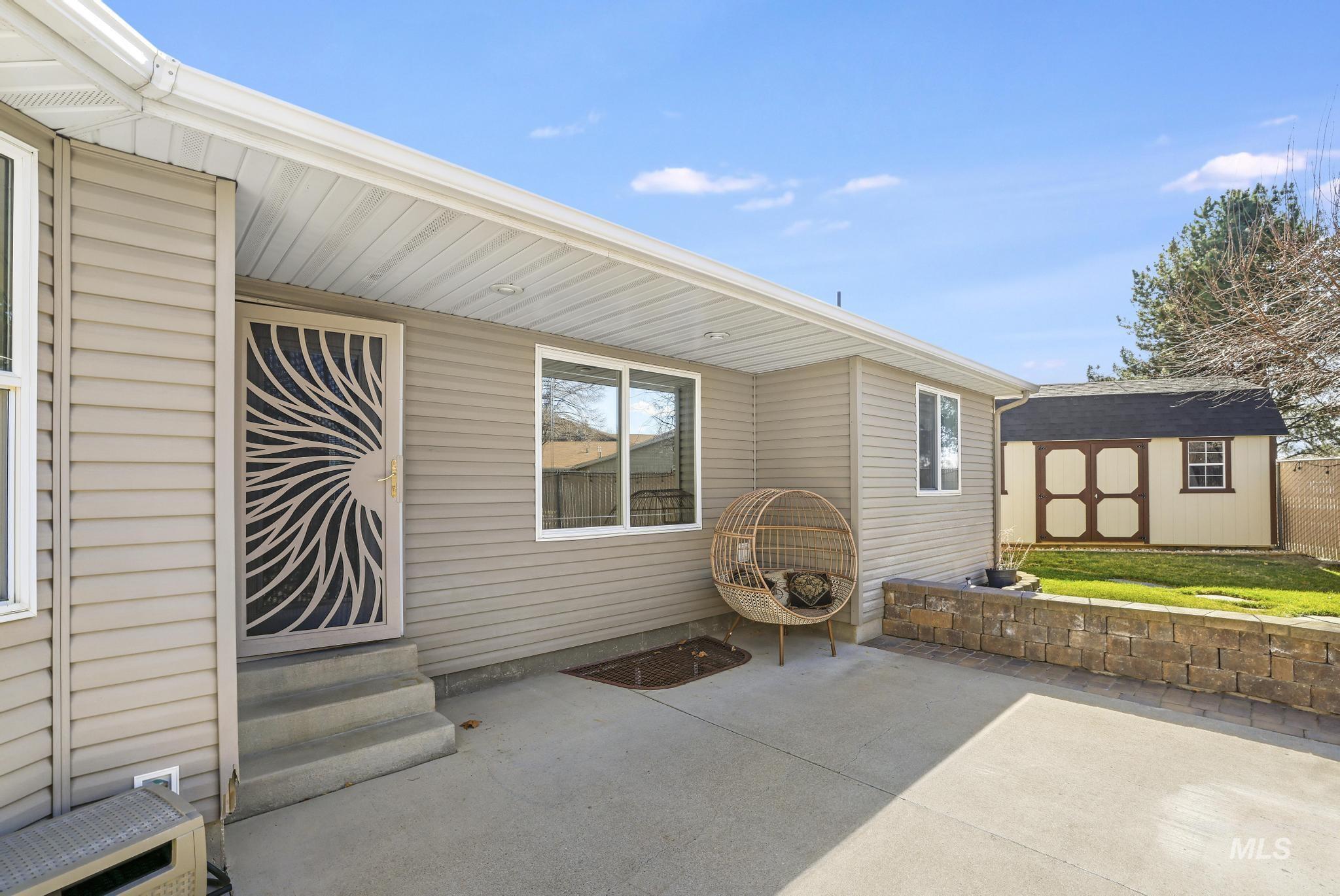 733 Beta Circle Twin Falls, ID 83301 - Photo 44 of 50 View of patio / terrace with a storage unit and entry steps