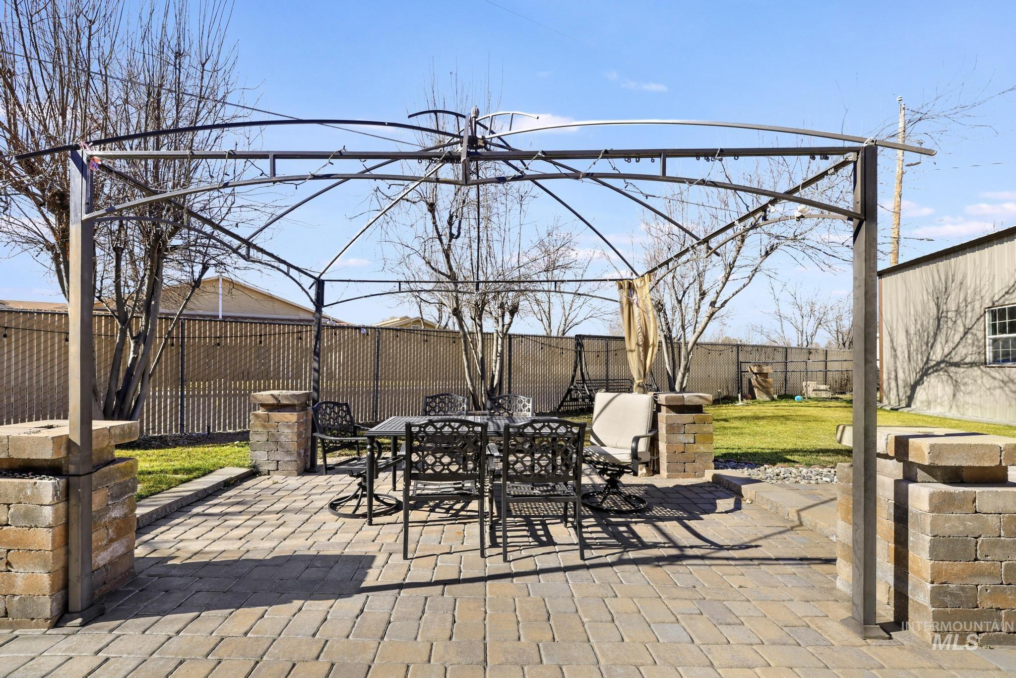 733 Beta Circle Twin Falls, ID 83301 - Photo 45 of 50 Fenced backyard with outdoor dining area and a patio