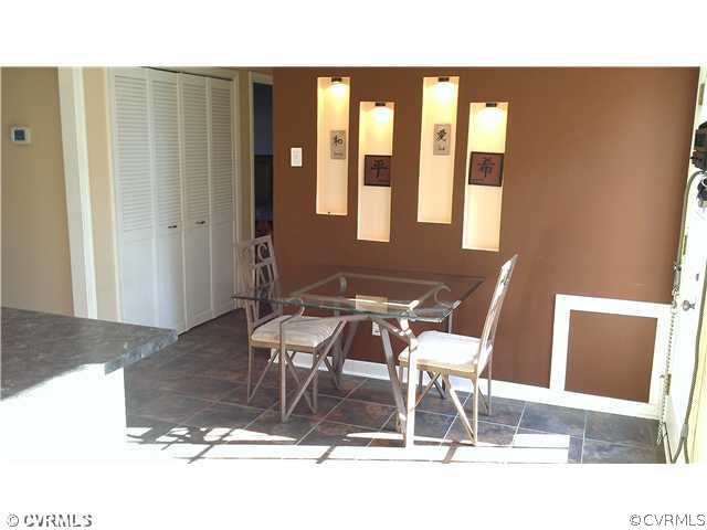 3114 Shiloh Church Road Midlothian, VA 23112 - Photo 11 of 24 a view of a dining room with furniture and wooden floor